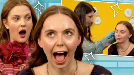 Drew and Audience Member getting a piercing